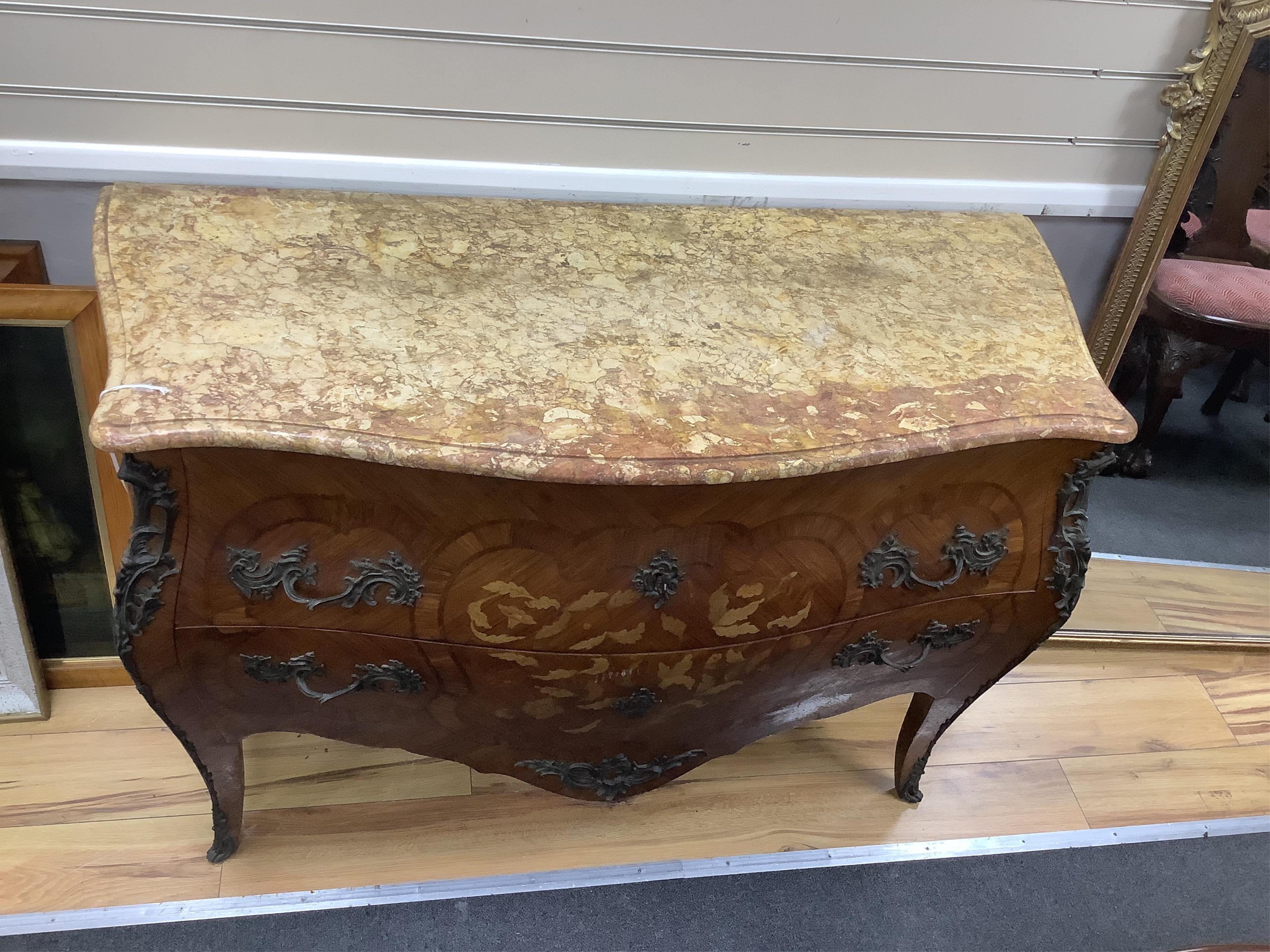 A French Louis XV style marble topped marquetry commode, width 127cm, depth 53cm, height 85cm. Condition - fair